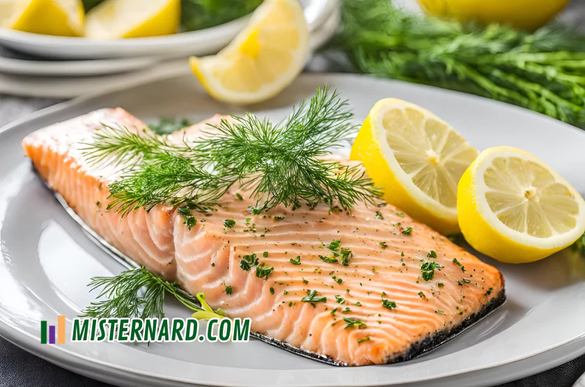 Delicious baked salmon fillets with lemon slices and fresh dill, a staple of the Mediterranean diet